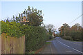 TM1359 : Stonham Aspal village sign in the hedge beside The Street by Adrian S Pye