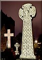 SS8377 : Three crosses in a churchyard by Alan Hughes