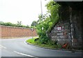 NY2548 : Junction of A596 and Station Road from railway bridge CBC3/87 by Luke Shaw