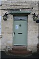 SK9934 : The pub door by Bob Harvey