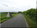 Resurfacing work on the road from Welton le Wold towards the A157