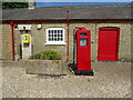 Trough and old fuel pump outside the Heneage Arms, Hainton