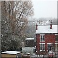 Snow falling on Garside Street