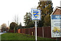 TG3208 : Brundall  village twinning sign by Adrian S Pye