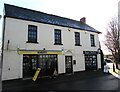 ST4287 : Estate agents office and barber shop in The Square,  Magor, Monmouthshire  by Jaggery