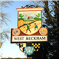 TG1339 : West Beckham village sign by Adrian S Pye