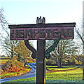 TG1037 : Hempstead village sign by Adrian S Pye