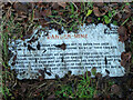 Sign lying on ground near Brightling Mine