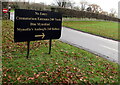 Black board near the exit road from Coychurch Crematorium