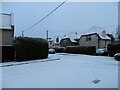 NZ1051 : Snow covered street by Robert Graham