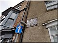 Old direction sign to Market Place