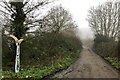 Millennium milepost on Weasel Lane cycle route