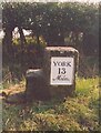 Old Milestone, on the A166, 300m E of Garrowby Lodge