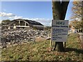 Sign promoting future car park on demolition site