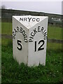 Old Milestone, on the A170, Pickering Road