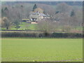 Distant view to a nice country house or farm house