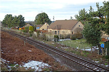 NJ3058 : Houses beside the Railway by Anne Burgess