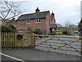 Rural cottage beside the path