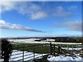 NZ1152 : View across snowy fields by Robert Graham