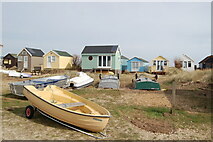SZ1891 : Boats and beach huts on Mudeford spit by Clive Perrin