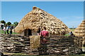 SU1332 : Reconstruction of ancient dwellings at Old Sarum by Clive Perrin