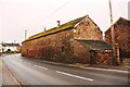 NY5733 : Building on NW side of A686 at Town Head Farm by Roger Templeman