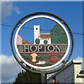TL9978 : Hopton All Saints village sign (detail south face) by Adrian S Pye