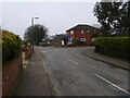 Junction of Cherry Tree Lane and Entrance to Queensway Estate