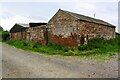 Barns on south side of farm road west of Eskrigg