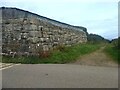 The bridleway next to the very substantial barn