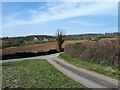 Road junction, with view towards Bridewell Farm