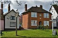 Debenham High Street with village sign