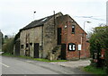 Barn with parish council notice board