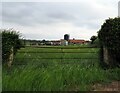 Honeysyke Farm through a gateway on Packman Lane