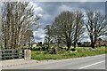 Methwold, Hythe: Severalls Road from the bridge over the Cut-off Channel