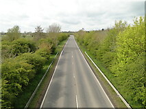 TM2986 : A143 Old Railway Road from the farm overbridge by Adrian S Pye