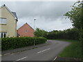 Towards a bend in Cae Melin, Little Mill, Monmouthshire