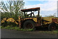 Abandoned JCB on Harlington Road