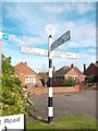 Direction Sign ? Signpost by a roundabout in Hanslope