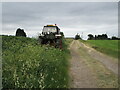 SK2113 : Old tractor and track to Pessall Farm by Jonathan Thacker