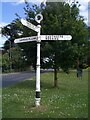 Direction Sign ? Signpost on the green in Copford Green