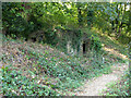 Disused building by course of old railway