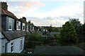 The backs of houses and gardens at Rossie Island Road, Angus