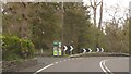 Telephone box on A5 at Padog