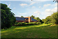 Glimpse of community centre,  Maidenbower, Crawley