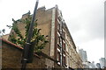 View of a Poulton & Nicholson ghost sign on the side of Morrell House on Curtain Road