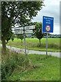 TL9233 : Signpost & Roadsign on Bures Road by Geographer
