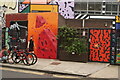 View of street art on a wall at the rear of Rich Mix from Redchurch Street