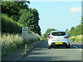 A38, The Leigh village sign