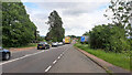 Sheep crossing the A40, Huntley